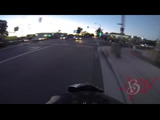 Motorcyclist sticks an "i dont stop for cops" sticker on a cop car and flees