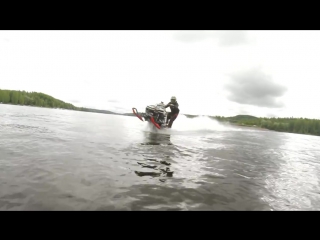 Snowmobile wheelies on water