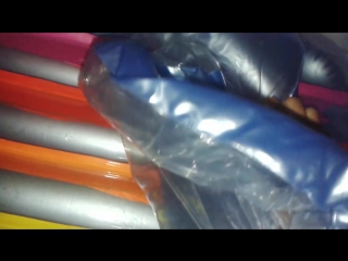 Blue and rainbow colors air mattress deflting