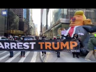 Protests erupt outside trump tower calling for donald's arrest after he returned to nyc