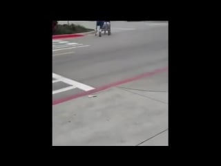 Amputee woman crutching on street