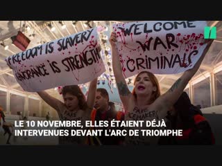 "активистка" движения femen прорвалась к кортежу трампа des femen forcent la sécurité au passage de la voiture de trump sur le