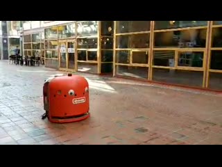 Someone put googly eyes on the robot vacuum cleaner at my uni, and it's the best thing i've seen today