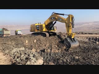 Cat 6015b loading trucks and operator view sotiriadis brothers