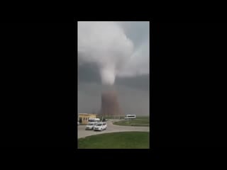 Watch powerful tornado touches down in romanian countryside leaving wreckage behind
