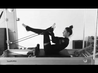 Masha efrosinina doing pilates in unitard territory of yoga