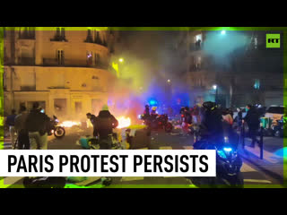 Tear gas, stun grenades fly as protests over pension reform continue in paris