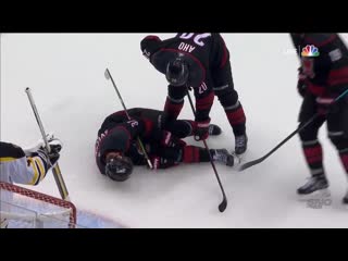 Andrei svechnikov falls awkwardly injures leg after battle with zdeno chara