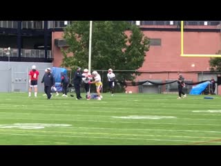 Julian edelman working on a ball security drill with antonio brown