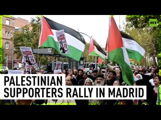 Pro gaza protesters in madrid gather outside israeli embassy