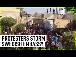 Protestors storm swedish embassy after quran burning