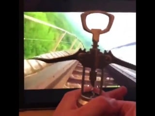 Mr bottle opener rides a rollercoaster