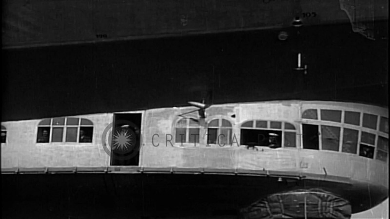 Lz 127 graf zeppelin airship in flight and being maneuvered on ground, at lakehur hd stock footage