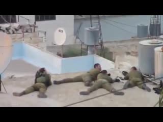 Idf snipers shoot at porn playing on rooftop in gaza 360p