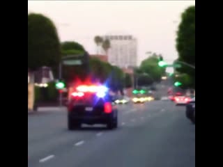 Beverly hills police department responding to call code 3