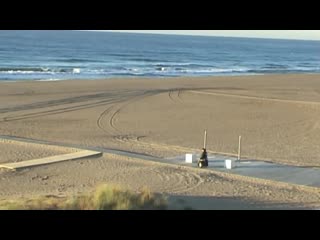 Paolo badano genny mobility sedia a rotelle in spiaggia barcellona segway wheelchair