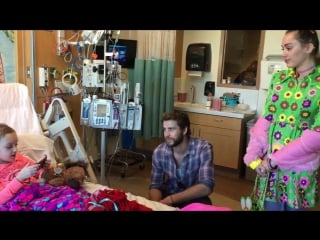 Miley cyrus and liam hemsworth visit julia davidson at rady childrens hospital