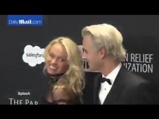 Pamela anderson son, brandon lee arrive at help haiti home