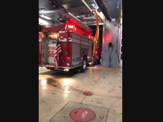Fire truck with a vacuum that attaches to its exhaust so it doesn’t fill the building with fumes