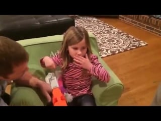 Coolest dad ever! (shoots out daughters tooth with nerf gun)