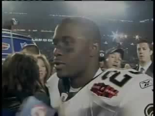 Kim kardashian and reggie bush celebrate with a kiss after the saints super bowl win!