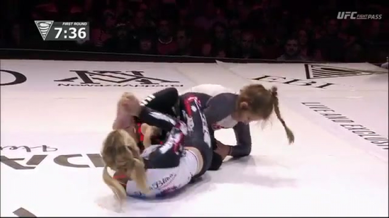 Women grappling headscissors finish {}