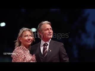 Mads and his wife hanne jacobsen arrives on the red carpet during the 77th venice film festival