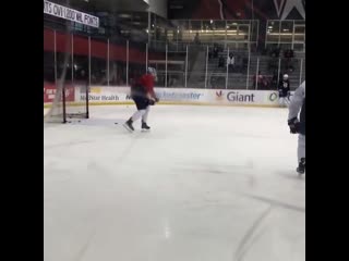 Jakub vrana dons goalie mask during tip drill