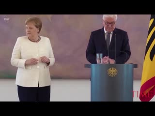 Germany's angela merkel seen shaking for second time in a week at berlin event time