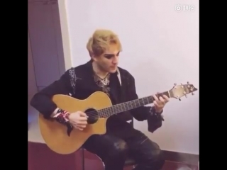 Mikele playing the guitar (+ little "purple rain" excerpt)