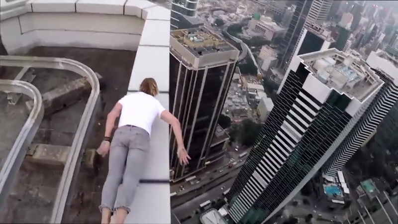 Руфер на краю небоскреба супер экстрим