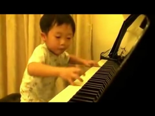 Gruzmob com 4 year old boy plays piano better 2637750