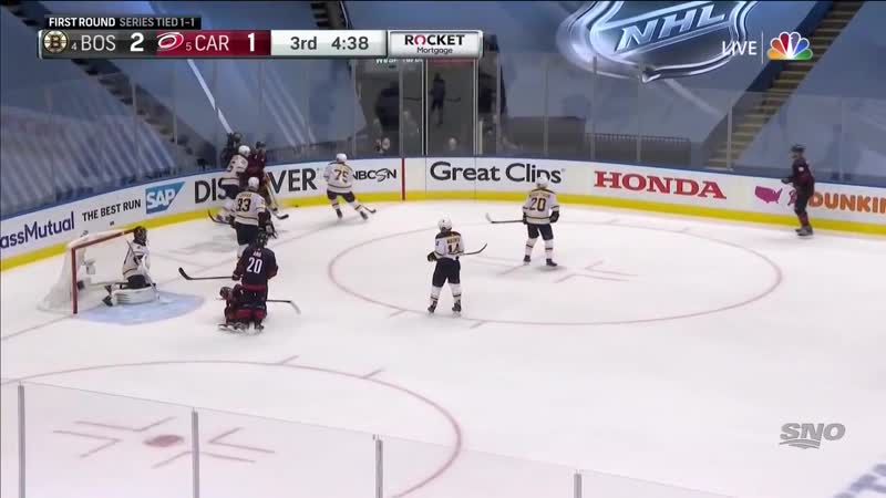 Andrei svechnikov falls awkwardly injures leg after battle with zdeno chara