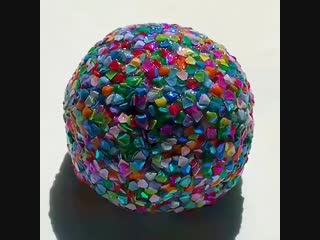 Жмёт прикольный разноцветный слаймик