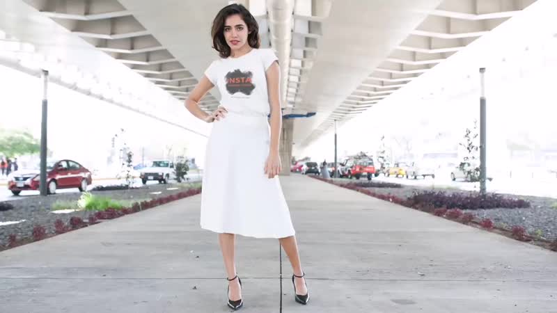 Motion porn video – Young woman wearing a long skirt and a t shirt stop motion in an urban environment a13599 mp4