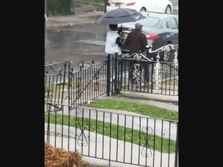 A mom was wondering where her son had gone she found out that he had seen an elderly neighbor walking in the rainstorm without