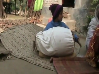 Litlle girl on mridanga in bengal