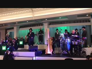 Shimmy levy and issac honig with the shira choir singing at the first event by the new krasna hl