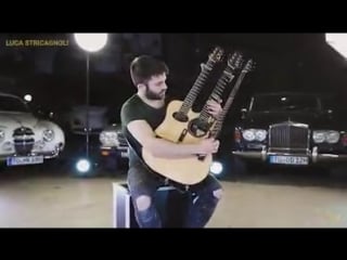 Music crowns luca stricagnoli covered the red hot chili peppers with his amazing 3 necked guitar! mp4