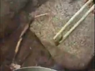 Hoods woods cave cooking 01 in the field