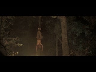 Hanged upside down & cut in half scene of haines