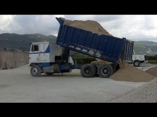 International 9670 eagle tipping out a full load of aggregate