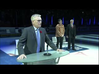 Vancouver canucks raise a banner with the number 10 of pavel bure