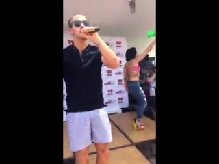 Demi spraying water over fans at castaways in chicago july 3