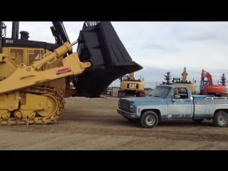 Bulldozer car crush