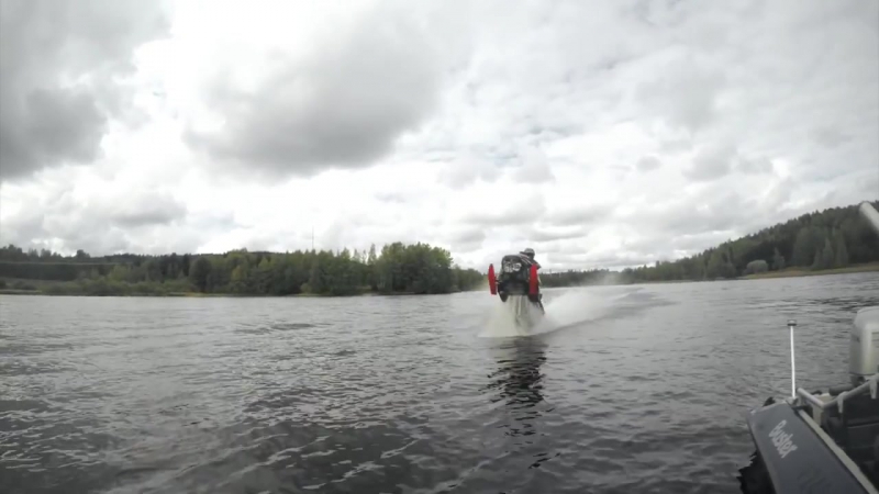 Snowmobile wheelies on water