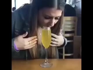 Chugging a mimosa with no hands mp4