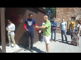 Martin from zimbabwe and ali from egypt in a queue to the doctor