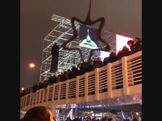 The overcrowded wooden bridge collapsed in the first minute of new year in moscow