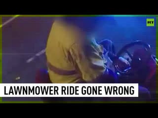 Cops bust drunk man riding lawnmower